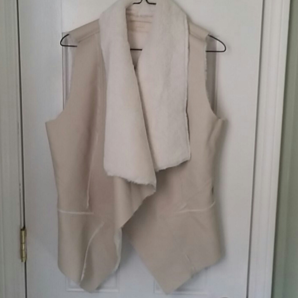 Asymetrical faux fur/faux leather vest